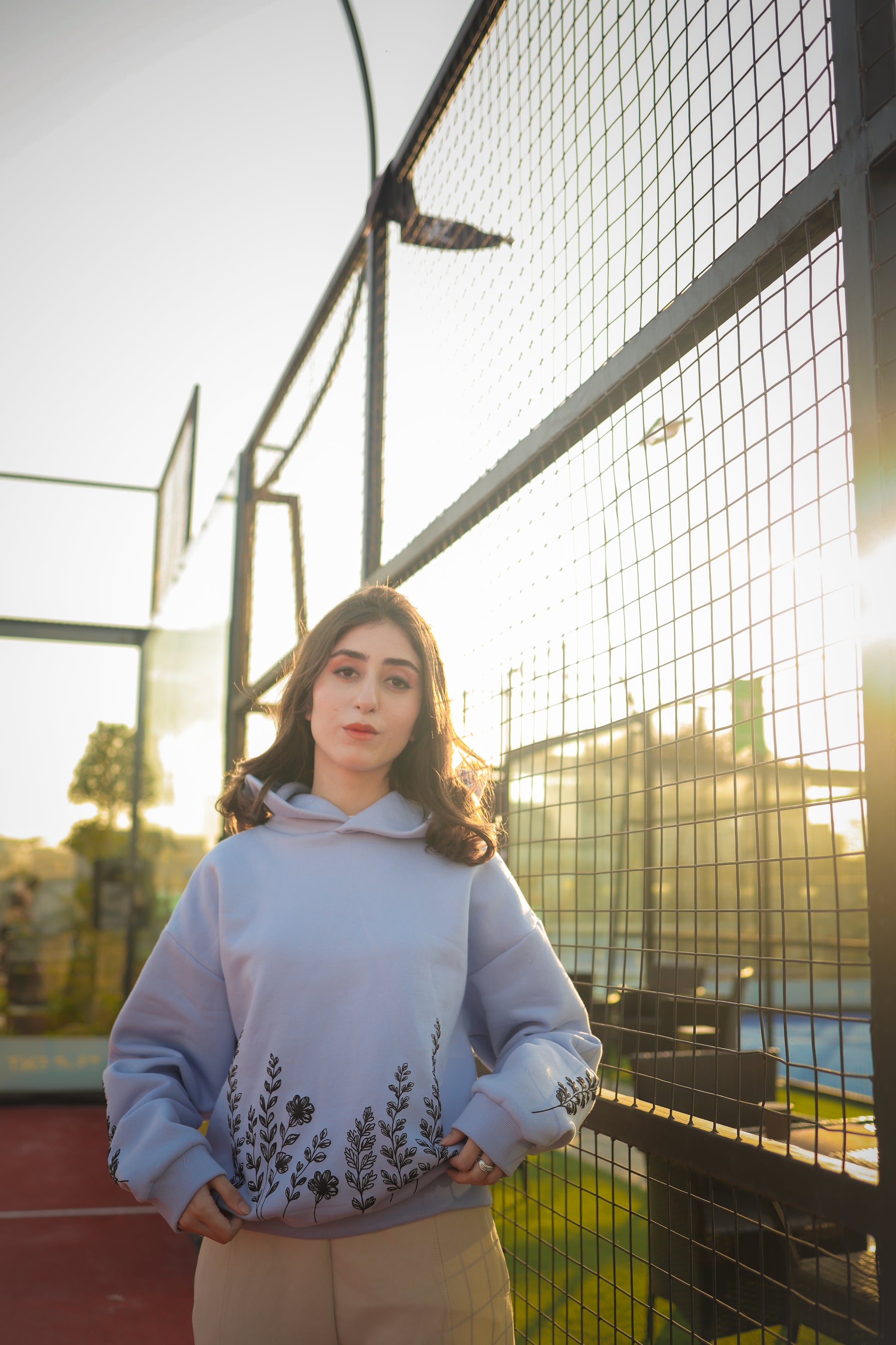 ELUX Floral Garden Hoodie worn in outdoor setting